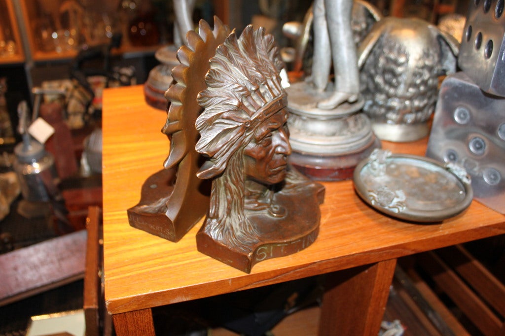These are extremely rare and desirable bronze  bookends cast by Gorham Founderies. The artist is J.L.Lambert a very well listed American sculptor. They  are dated 1911. The quality and detail of the casting is superb. They weigh at least 12- 15 lbs