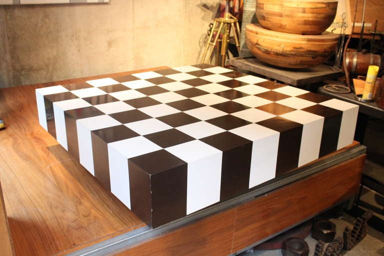 This table is perfect for a modern or classical setting. The colors are dark chocolate brown and white. The surface is a laminate and really great quality. The condition is very good with some minor chipping to corners.