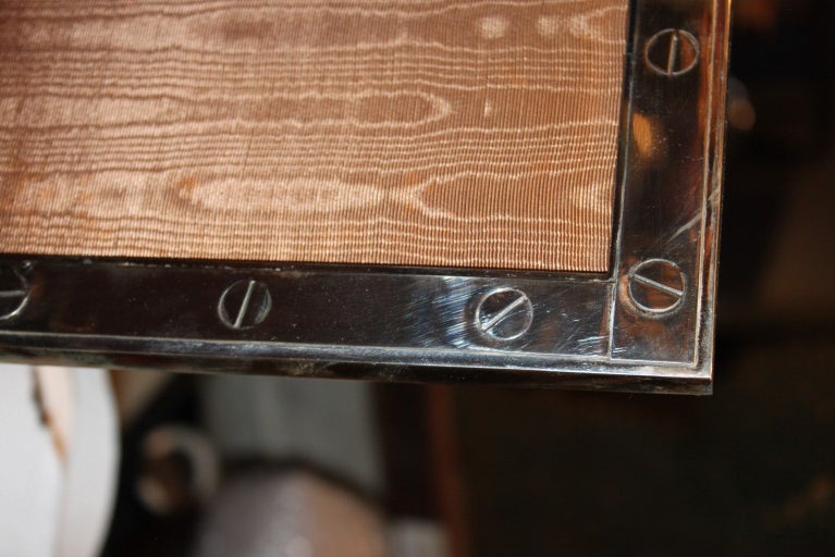 Rare and unusual Cartier sterling frame with Screw head motif