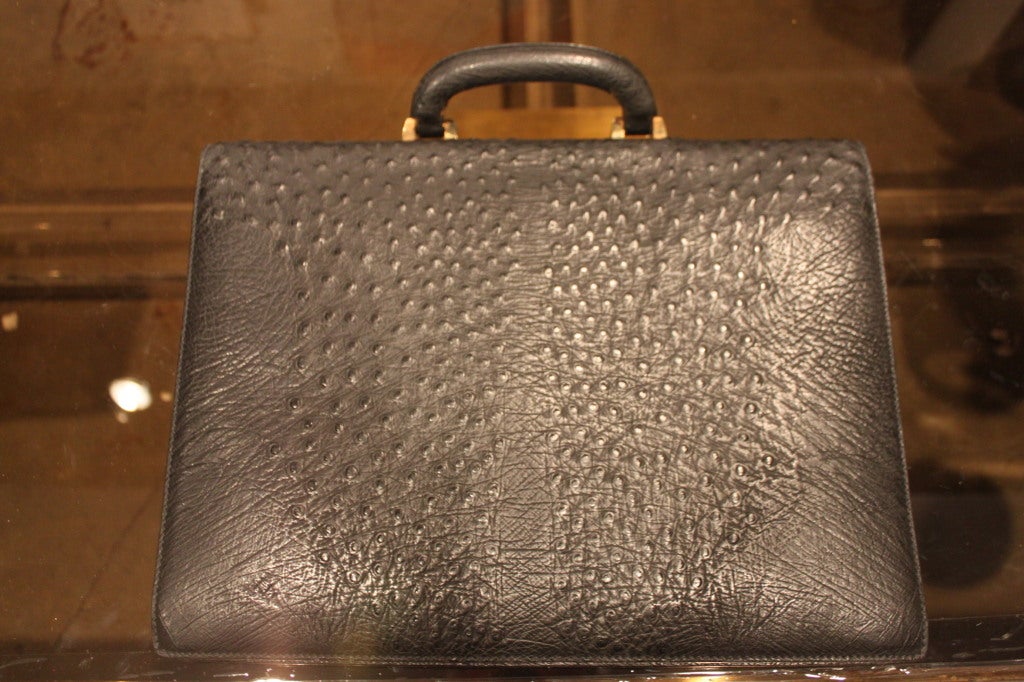 Incredible condition ostrich attaché by Gucci. So clean and so beautiful. Original key inside.