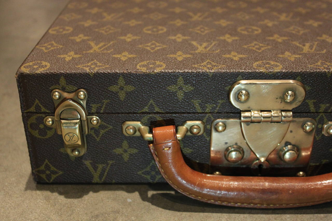 This is a very rare Vuitton jewelry box. It has a removable tray and is all original. The Vuitton box dates from the 1960s. Its made of vinyl, brass, leather and velvet.