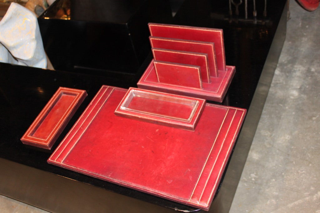Four piece Hermes desk set Designed by Dupre Lafon. The set is Hermes Red and is all top stitched.