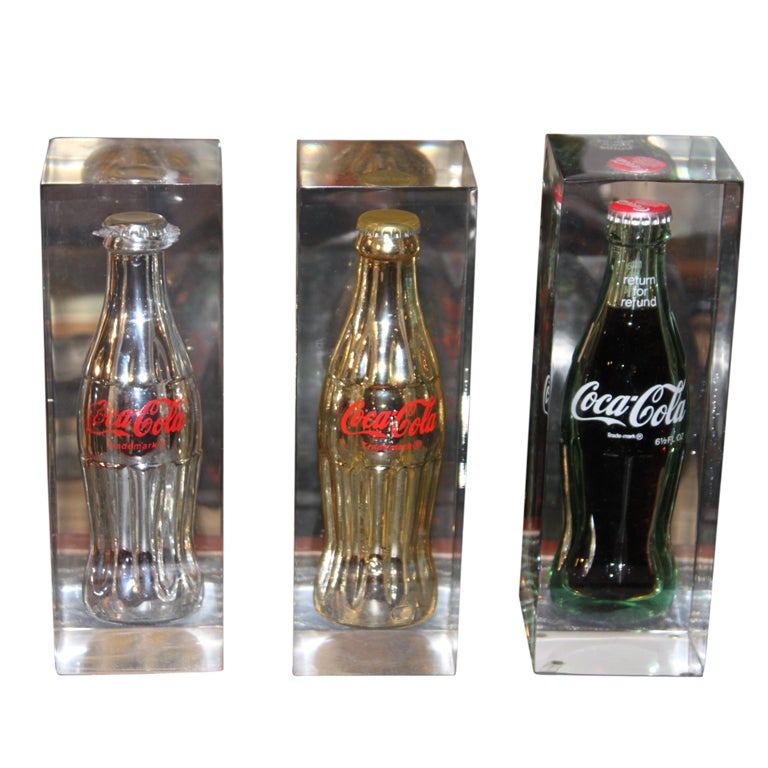 Collection of Coke bottles in Lucite For Sale