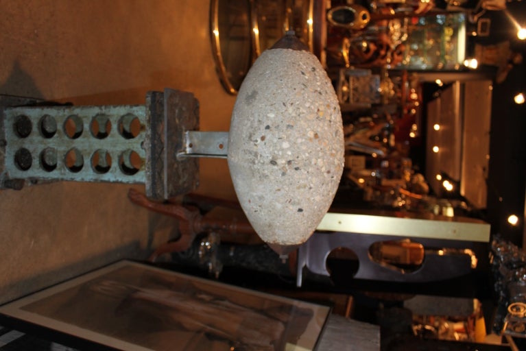 These figural mill weights are quite desirable and hard to find. This particular example is in the form of a football