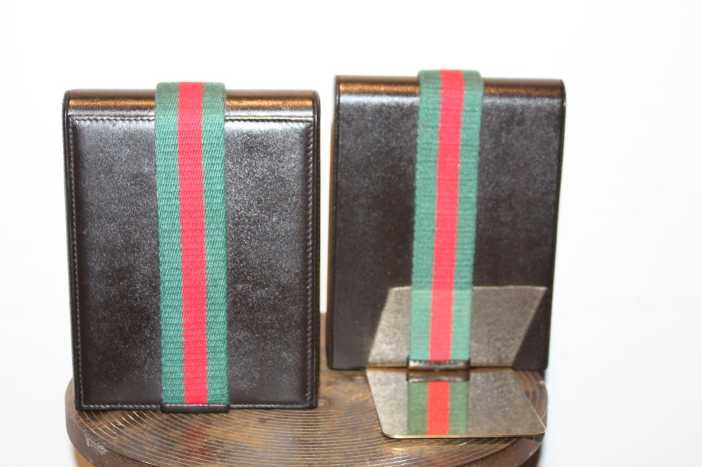Rare gucci bookends with iconic green and red and a gold plated base.. super chic