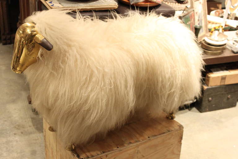 This is a beautiful gilt bronze and wool sheep stool. The condition is excellent. There is some wear to the gilding on the ears but actually looks great!