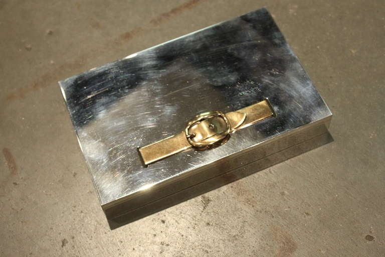 Great Hermes belt buckle box perfect for cards or cufflinks. It was originally was for cigarettes.
