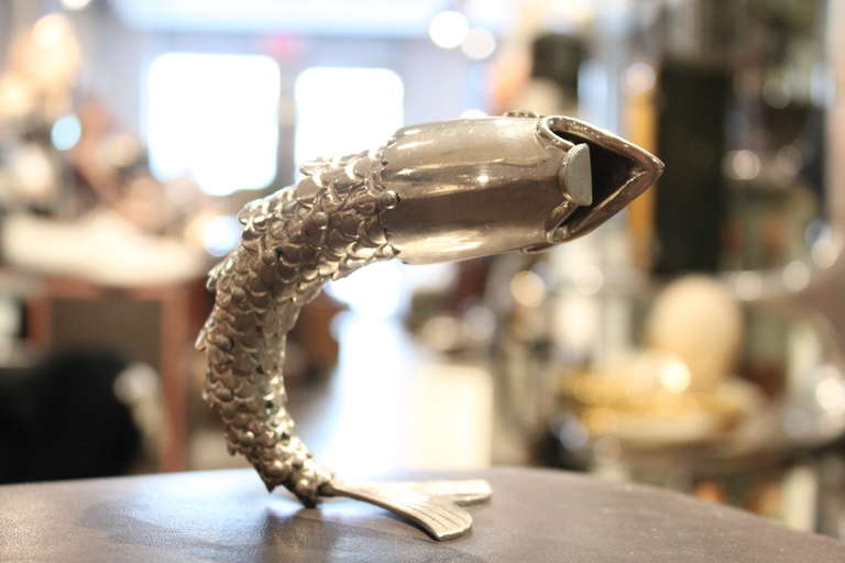 gucci fish bottle opener