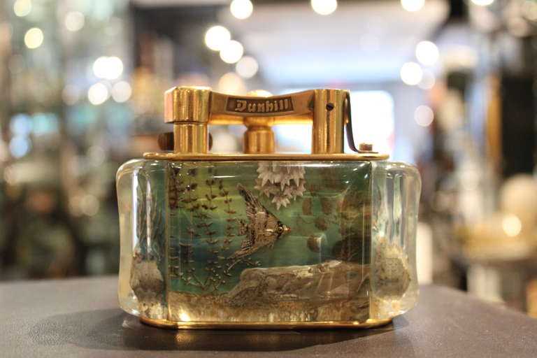 These Dunhill's are perhaps the most coveted of collectable lighters. The Aquariums are all reversed carved and painted making no two alike. Since their introduction in the 1950's, these Aquariums have been a must have for lighter users and