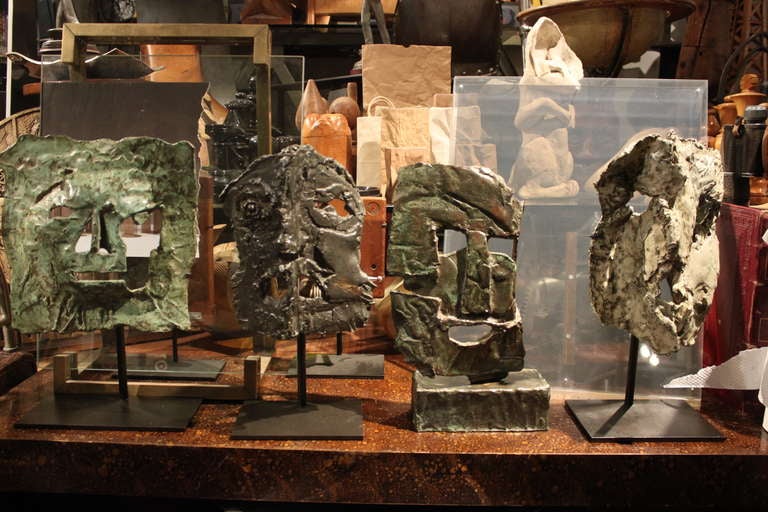 This collection of unique bronzes can be bought as a group or individually. One of the sculptures has a cartouche as illustrated in the image. We believe that they are all of the same artist's hand and had three of them mounted on custom stands as