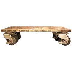 Amazing and Unique Coffee Table Fabricate from Giant Industrial Wheels