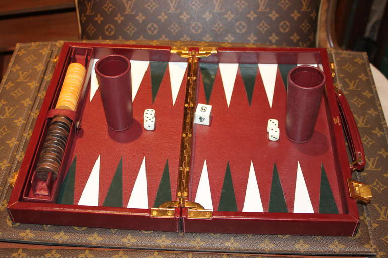 These backgammon sets are incredibly rare and hard to find in this condition. Everything about this set is indicative of the Hermes level of quality. The hinge and outer hardware are gold plated. The pieces are covered in a super fine leather. The