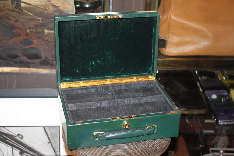 This is a great Hermes leather jewlery box for either a man or woman. It dates from the 1950's and and has gold plated hardware. The tray is removable.