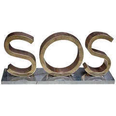 Giant Bronze SOS trade sign French 1930