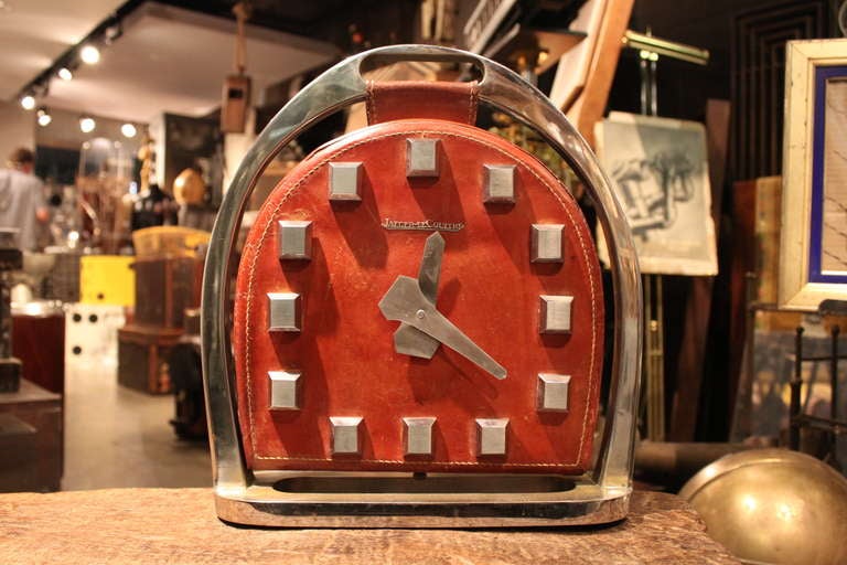 Super super rare Giant stirrup clock by Jaeger Le coultre . This clock was made in very limited numbers ..probably less than 50. The clock has an 8 day movement and is made of all hand stitched leather. It almost 14 inches high and just amazing..