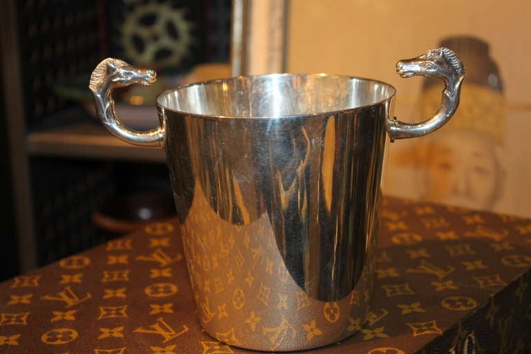 This Hermes ice bucket has double horse handles... and is super chic.