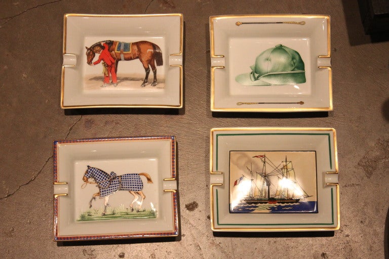 A collection of Hermes ceramic hand painted  ashtrays