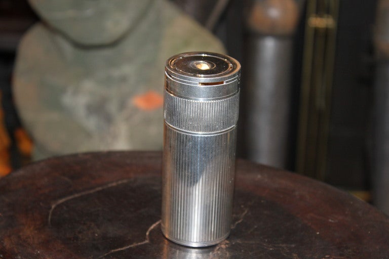 Super cool Dupont lighter that you twist to light. Its super quality and  rare to find