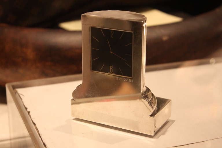 Amazing Sterling deco Column Clock is battery operated. So no need to ever wind. This clock was one of Bulgari's best designs.