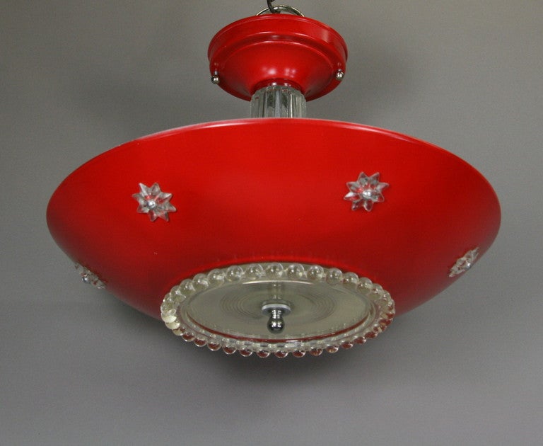 Red painted aluminum with a glass bottom dish and center column. Two light, circa 1970s.