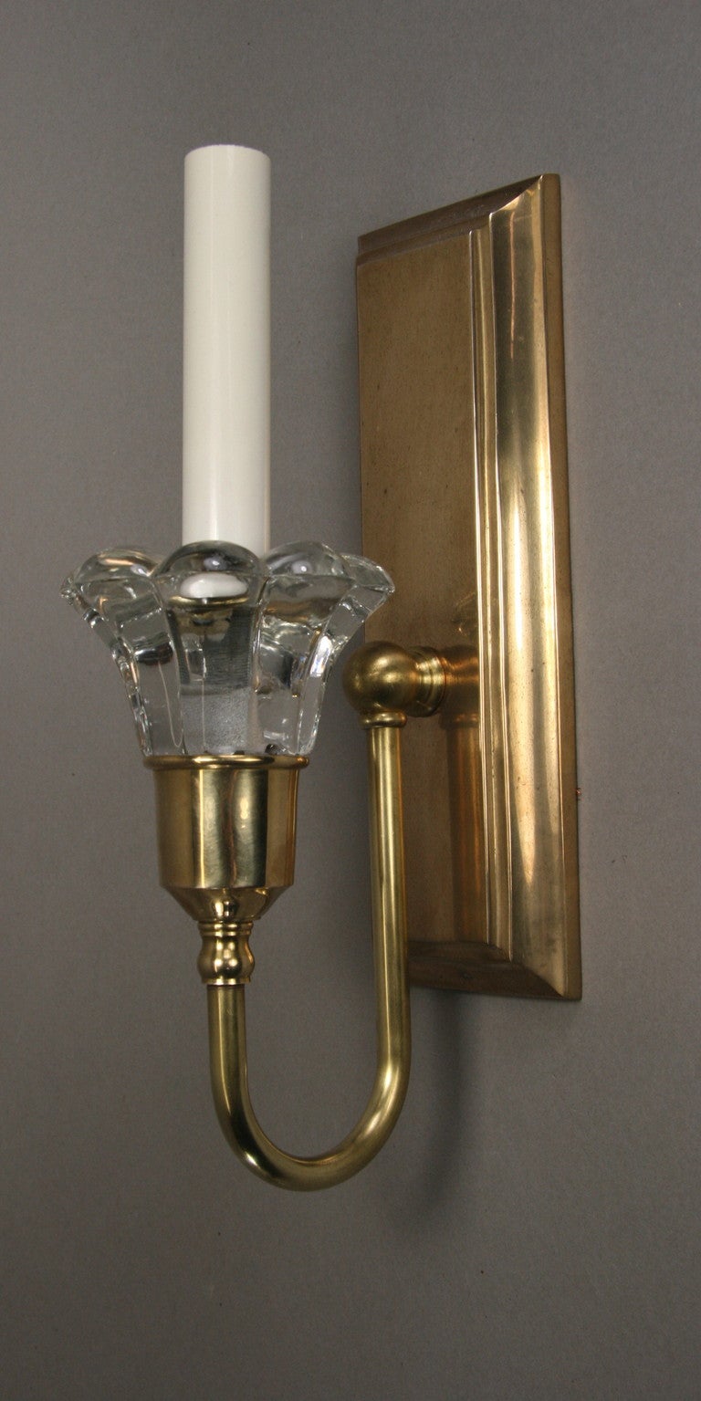 #2-1736 A pair of polished brass single arm sconce ending with a crystal  tulip.

2x3 switch box required