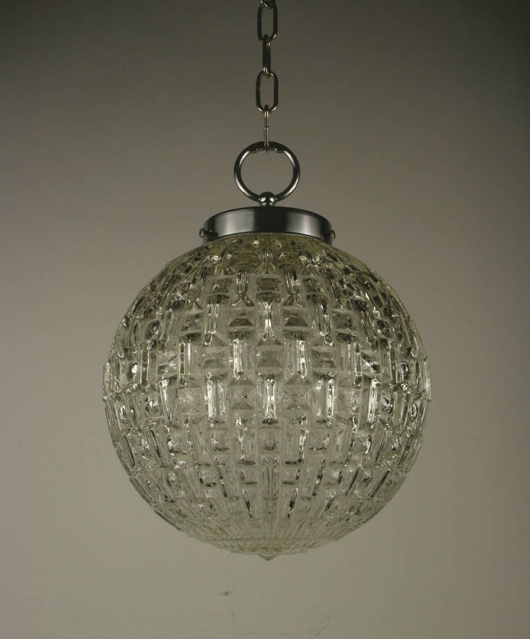 #1-2961ab  Geometric pattern clear glass sphere with nickel hardware.
Priced individually
ON SALE REGULAR PRICE $1675 net $975
NO ADDITIONAL DISCOUNTS