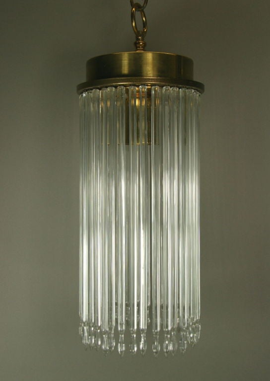 An Austrian crystal pencil-shaped ceiling light/pendant. 
Takes one 100 watt edison bulb
 
 