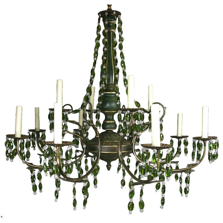 #1-2794 a large two-tier twelve-light brass and wood chandelier dressed with green crystal drops.

On sale regular price $4600 now $1975

No additional discounts.