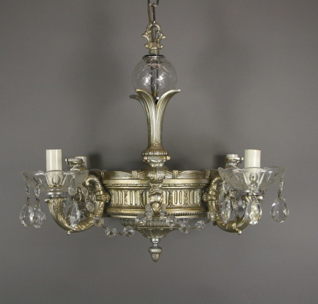 #1-2819, an ornate four-arm silver finish Italian chandelier dressed with crystal beads.