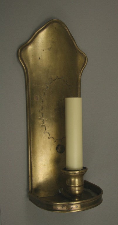 #2-1688, an English traditional brass single light sconce with a backplate depicting sailing ship.
