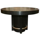 Round blackened dining table