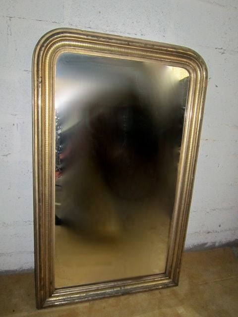 19th century gilden mirror. Original gilding.