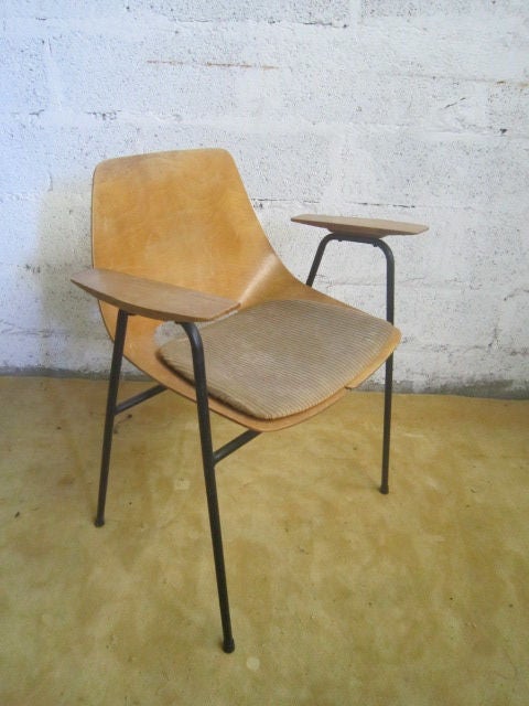 Rare variant of the classic tonneau chair from the 1950's 