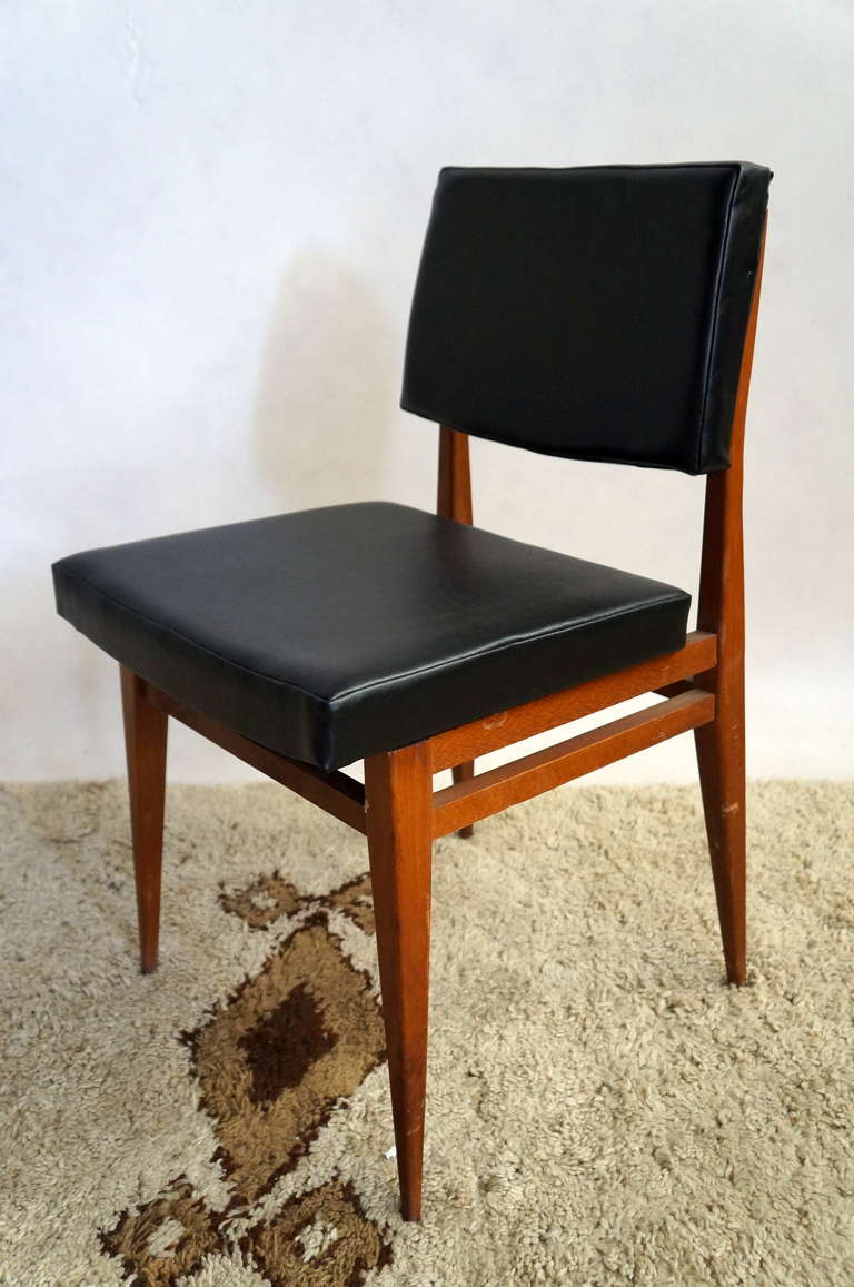 beautiful scandinavian chairs from the 1950's in original condition 
Seven black chairs, two red and one brown leatherette chairs