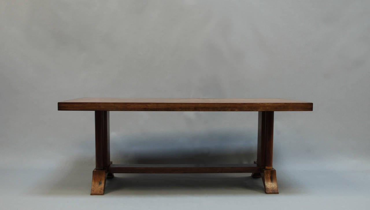 Fine French Art Deco walnut dining or writing table with brass details.
Two end leaves for a length of W 110