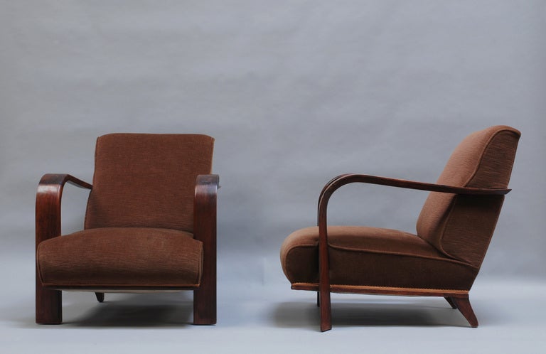 Pair of French Art Deco rosewood armchairs designed by Robert Block, edited by Athelia for 
