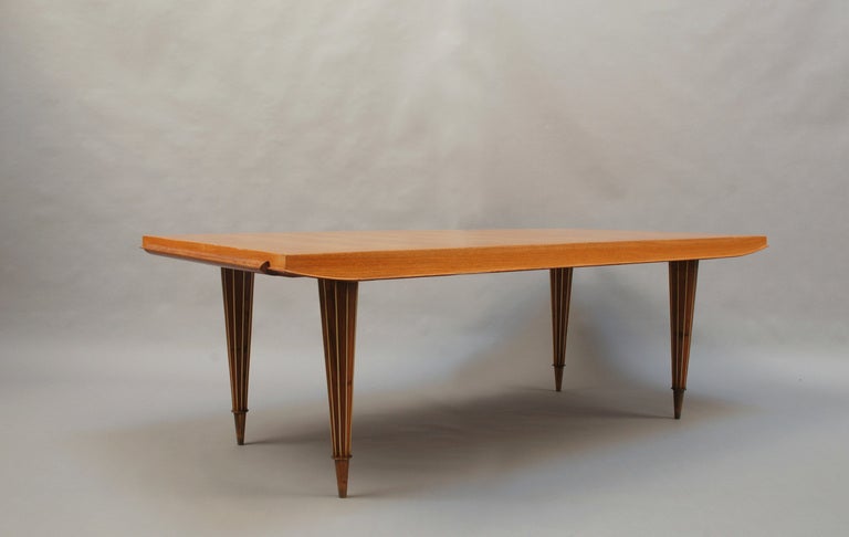 A Fine French Art Deco Expandable Dining Table with Ribbed Brass Conical Legs For Sale 4
