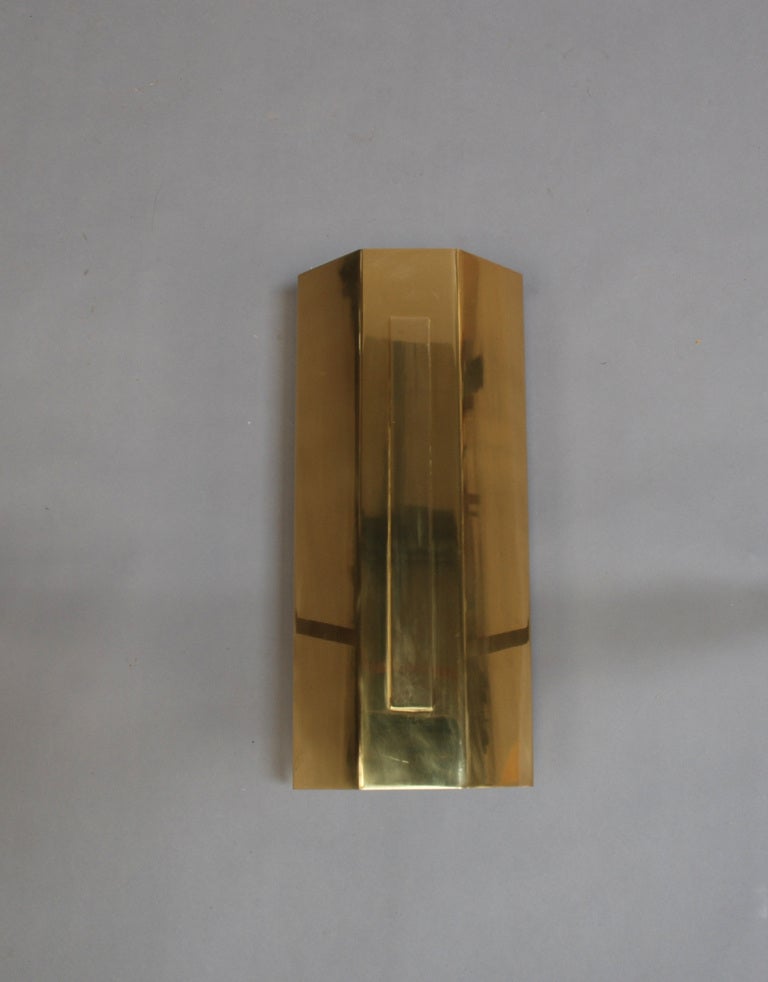 15 large 1970s polished bronze sconces by Jean Perzel (1892-1986). Signed. Price is per sconce.
 