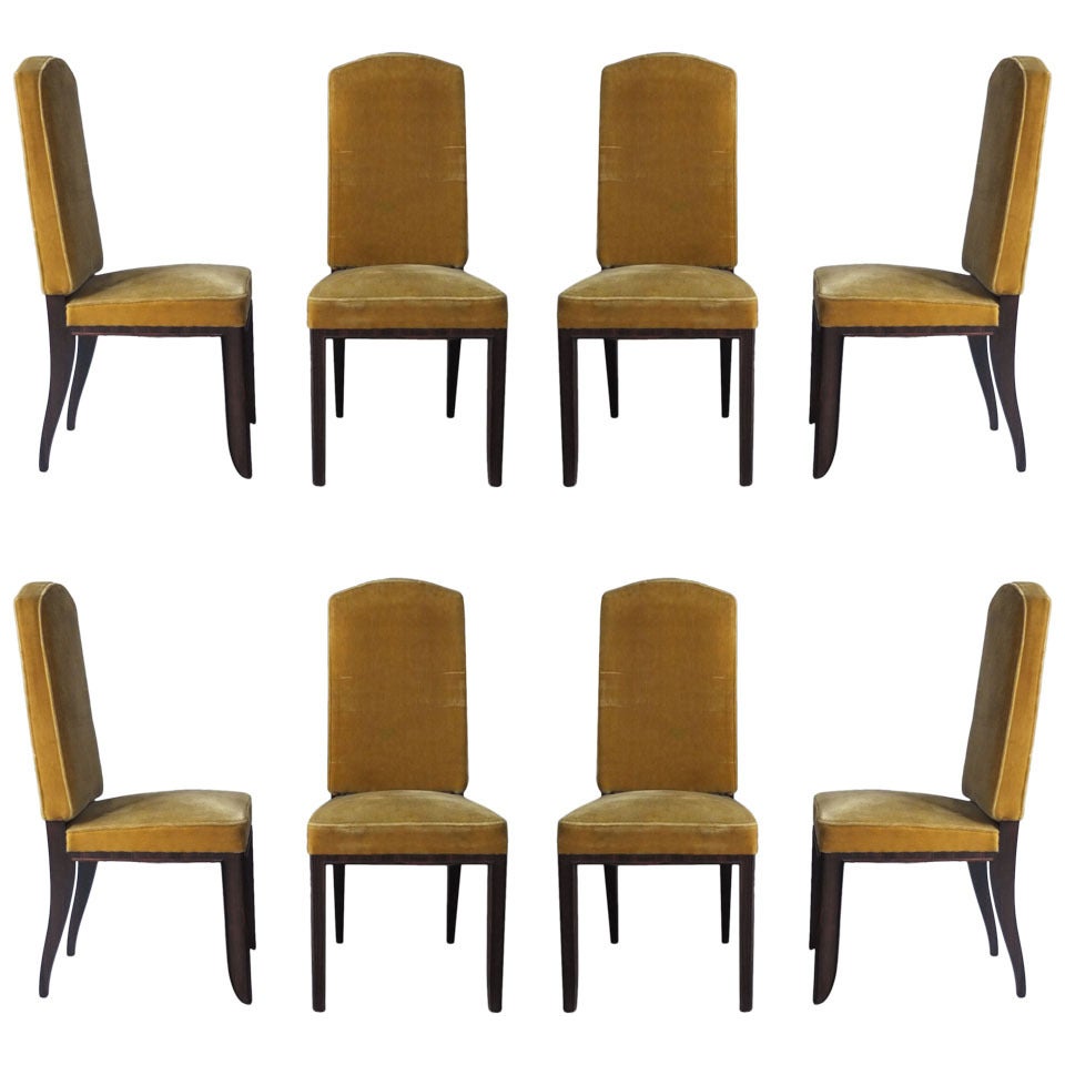 A Set of 8 Fine French Art Deco Macassar Ebony Dining Chairs by Paul Frechet