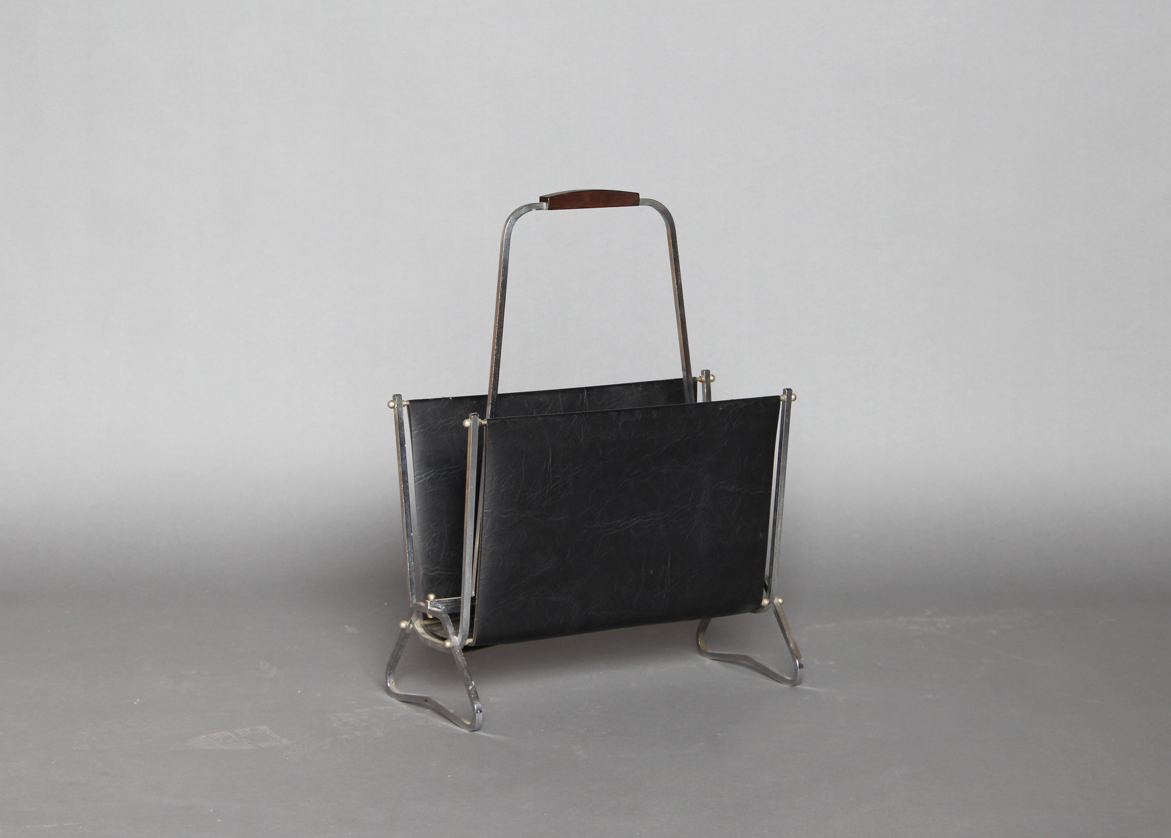 A French Art Deco Chrome and Leatherette Magazine Rack