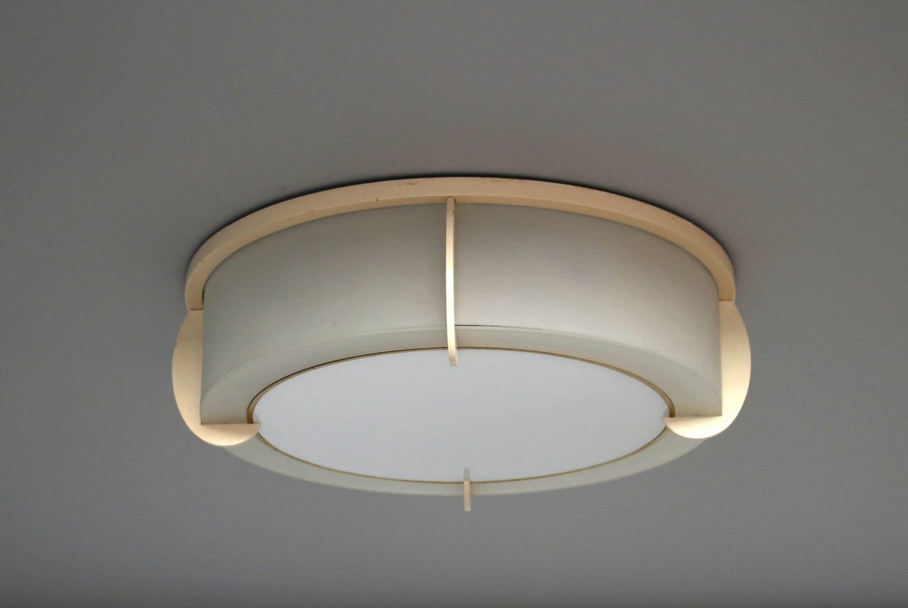 One Fine French Art Deco lacquered metal, frosted glass and enameled glass flush mount fixture by Perzel.

US re-wired with 4 standard sockets (400 watts per fixture).

Dealer ref. # 1260a