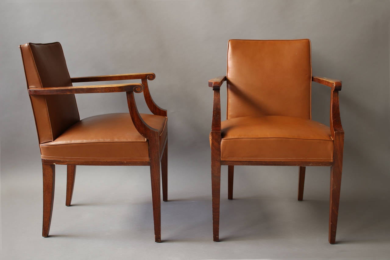 Pair of fine French Art Deco mahogany bridge or office chairs attributed to Jean Pascaud.
   