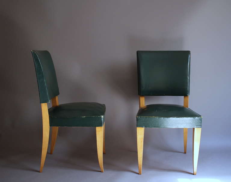Set of 8 French Art Deco sycamore dining chairs.