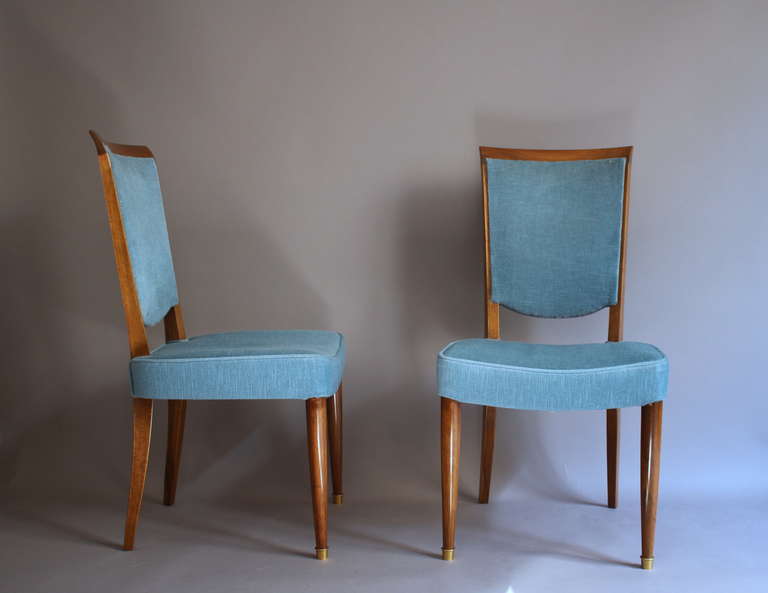 Set of six fine French, 1950s walnut dining chairs by Jules Leleu.