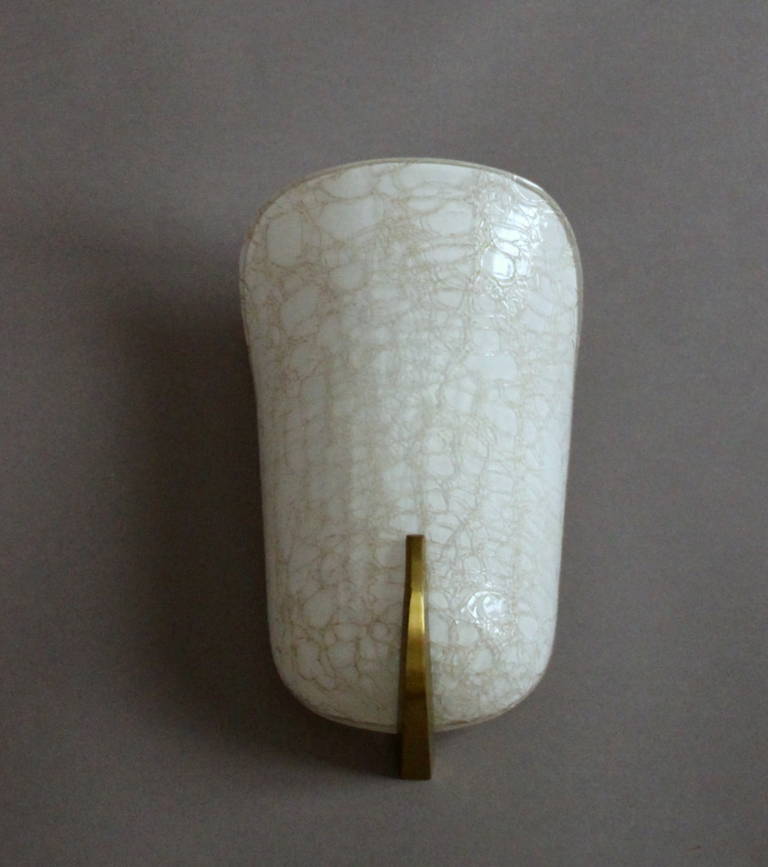 Fine French, 1950s bronze and "craquele" white glass sconce by Jean Perzel.