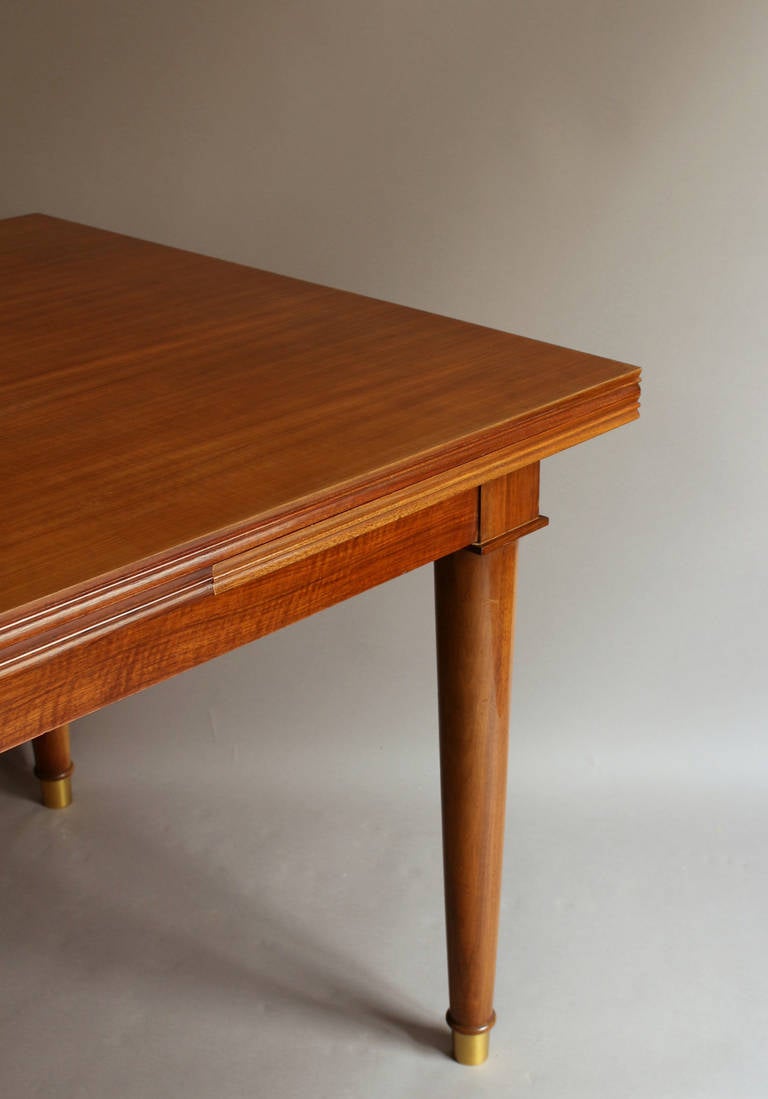 A Fine French Art Deco Walnut Extendable Dining Table by Jules Leleu 6