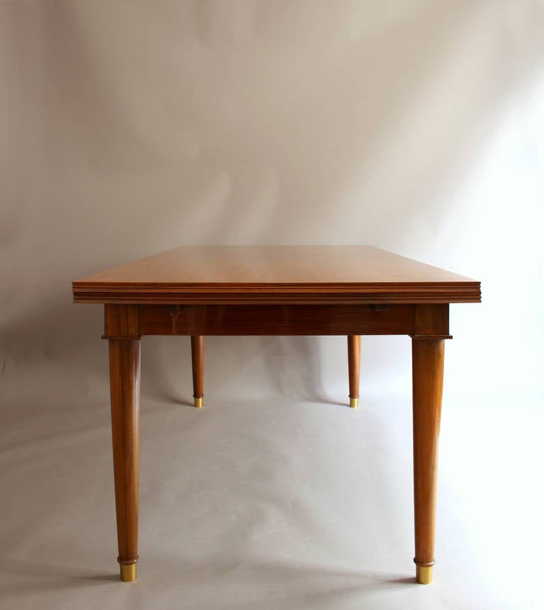 A Fine French Art Deco Walnut Extendable Dining Table by Jules Leleu 1
