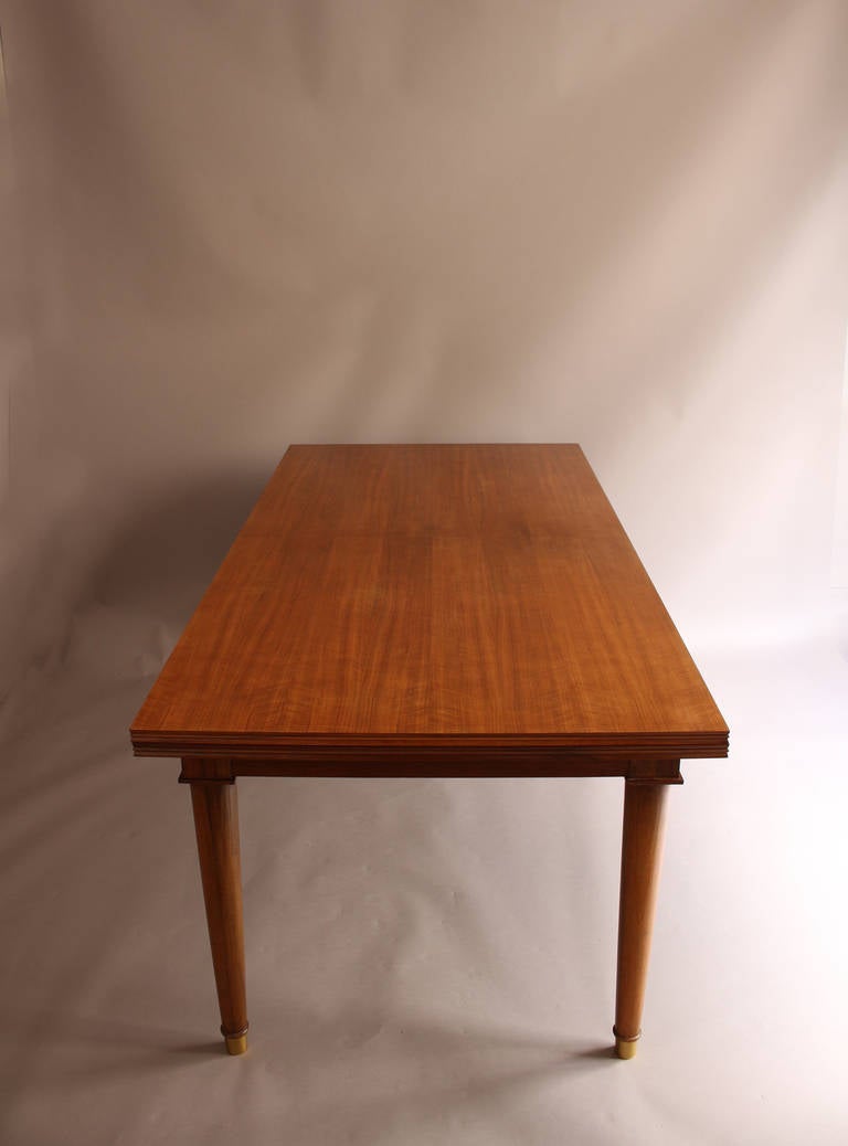A Fine French Art Deco Walnut Extendable Dining Table by Jules Leleu 2