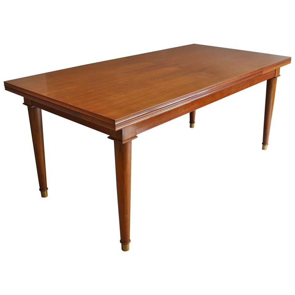 A Fine French Art Deco Walnut Extendable Dining Table by Jules Leleu