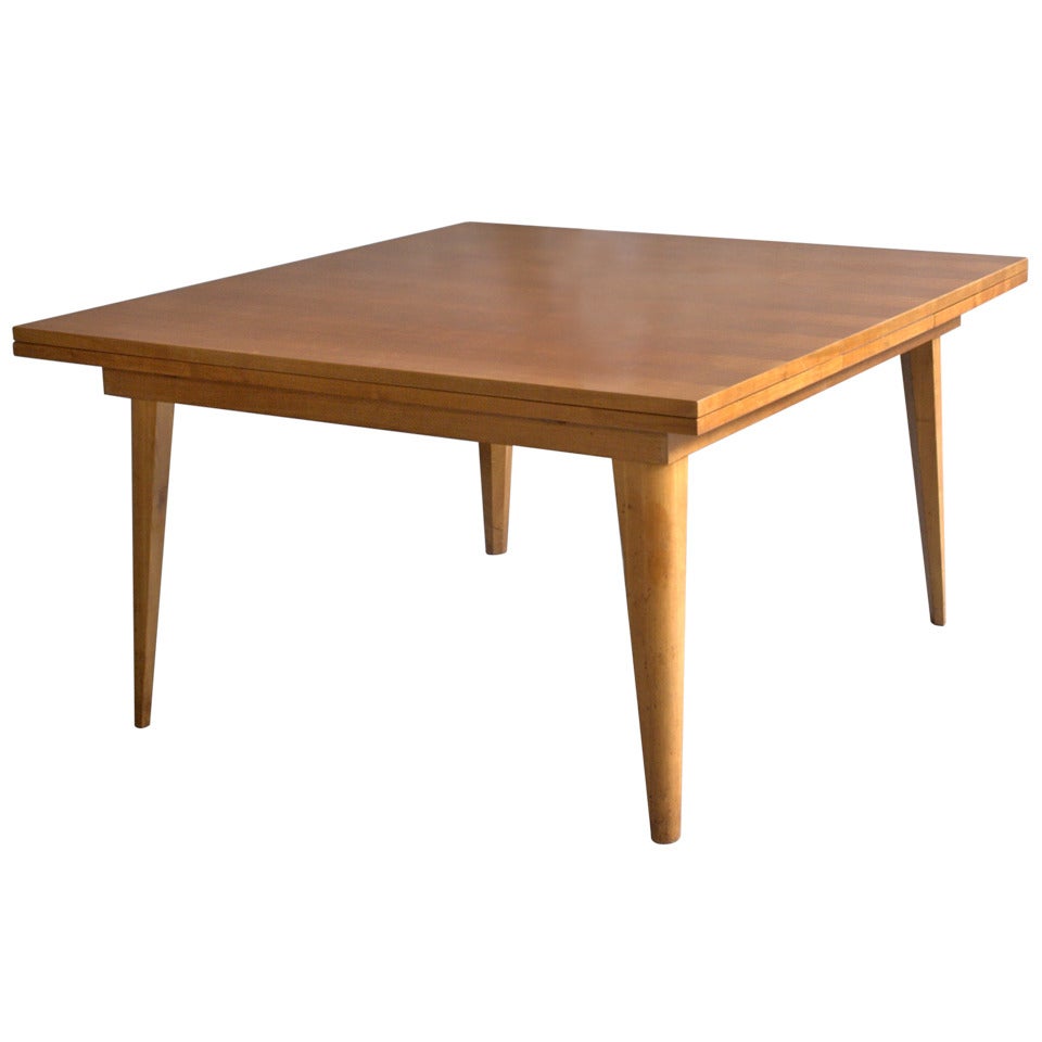 A Large French 1950's Cherry Wood Dining Table with Two Pull-Out End Leaves